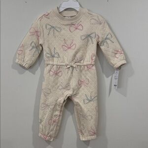 Cream Baby Jumpsuit with Bow Pattern